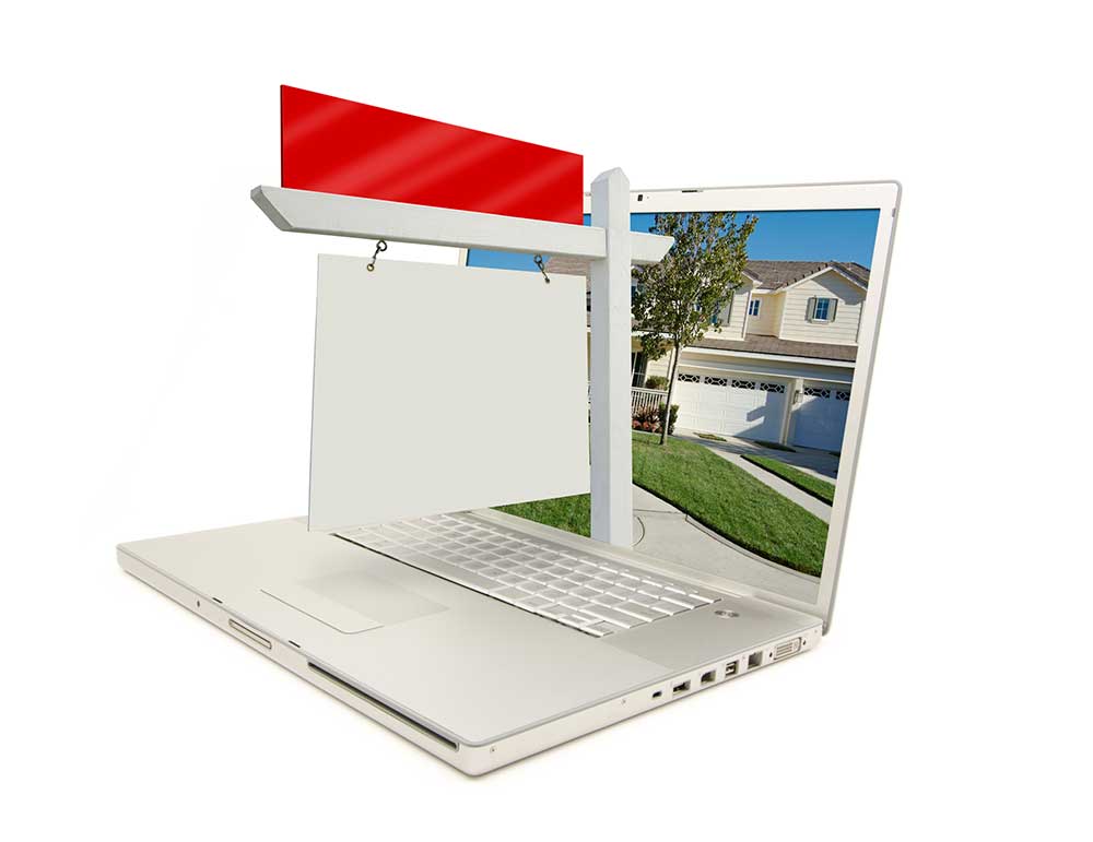 Laptop with real estate sign coming out of it